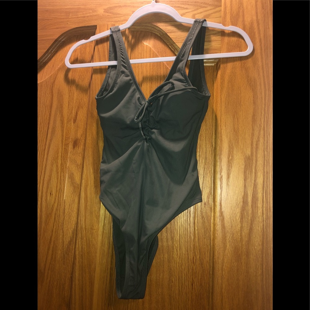 Green one piece swimsuit
